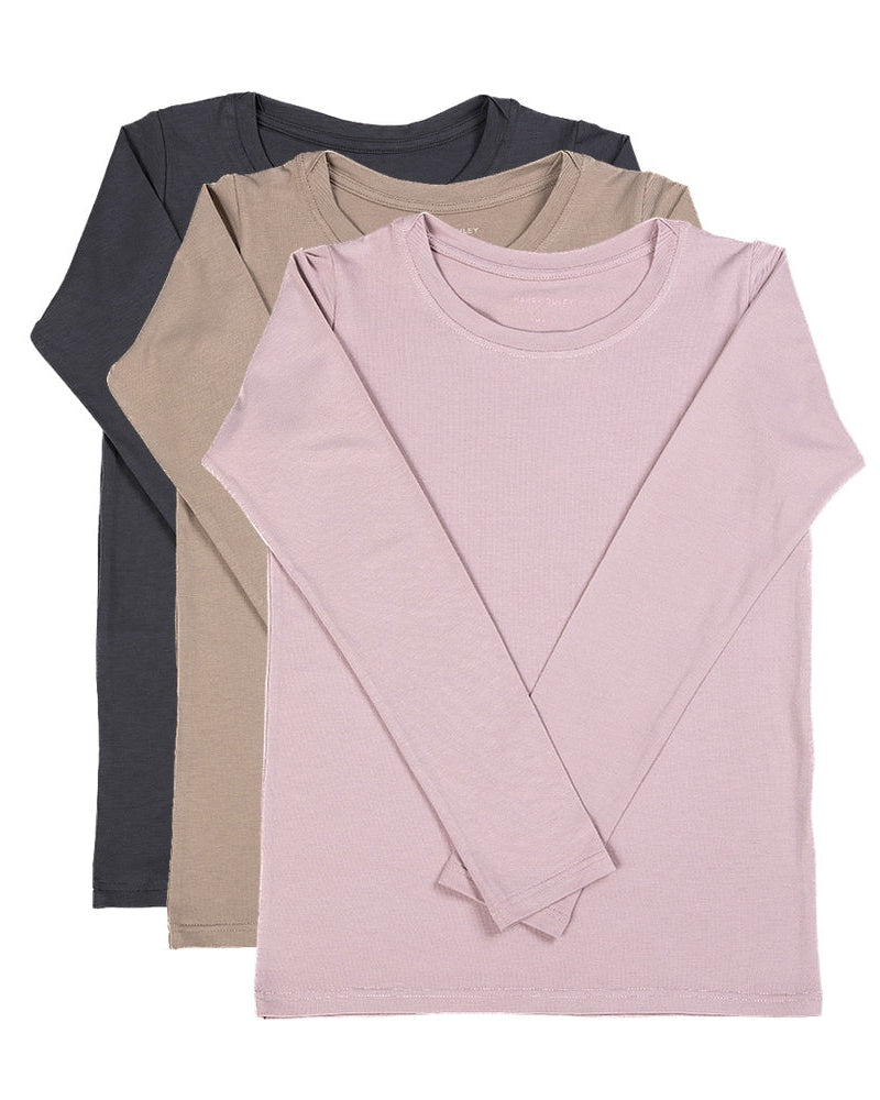 Three long-sleeve shirts in black, beige, and pink on a white background